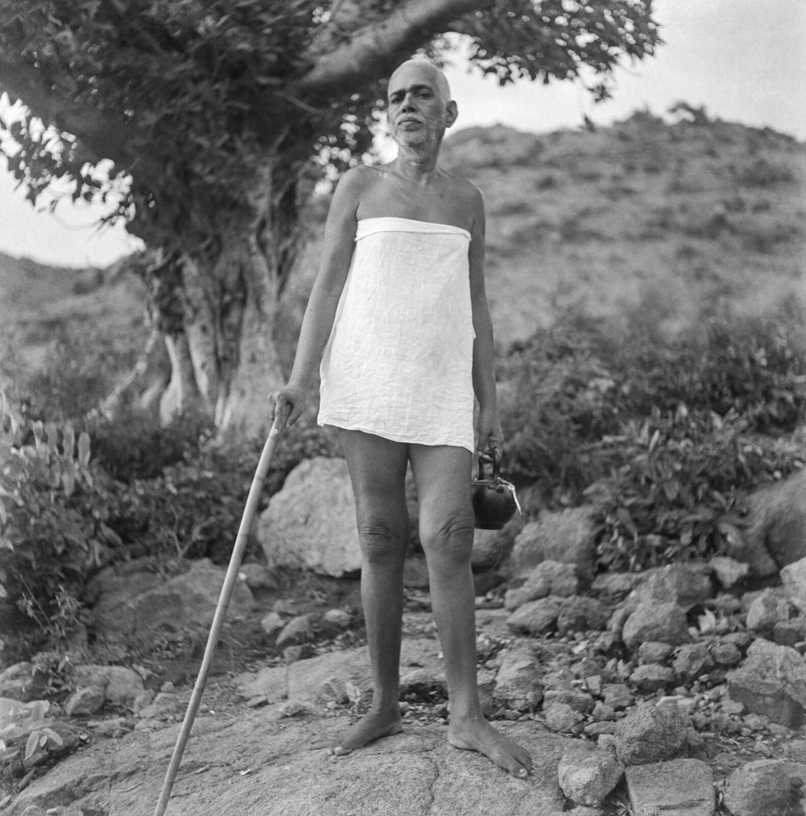 CAV_32_33_ac_from-glass-plate_sitting-on-stone-at-mango-tree-cave_first